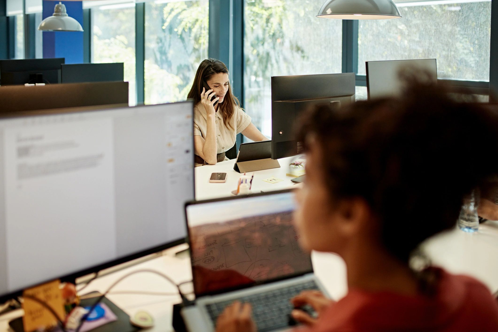 IT support professional working at a desktop computer