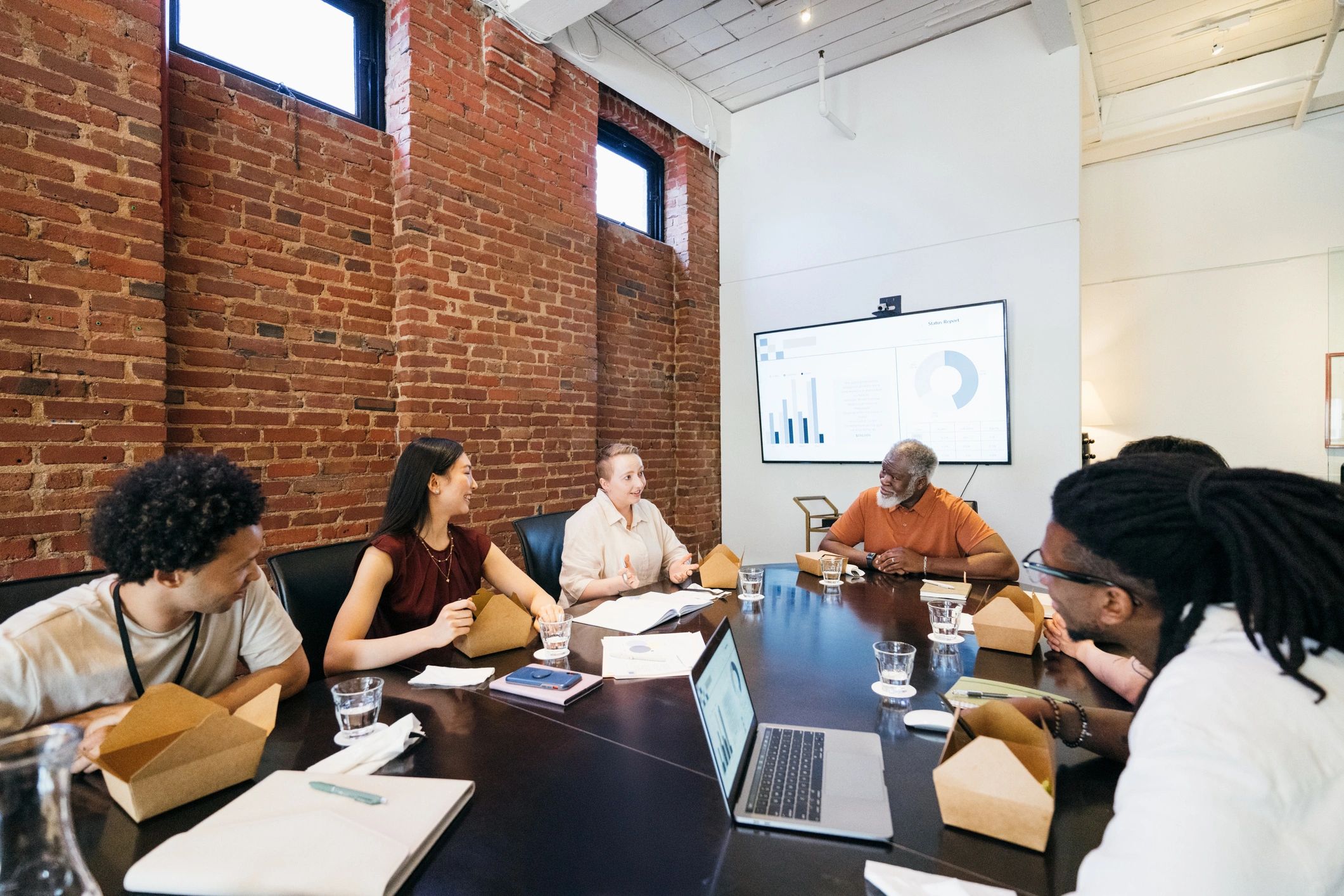 Business team collaborating during a boardroom meeting