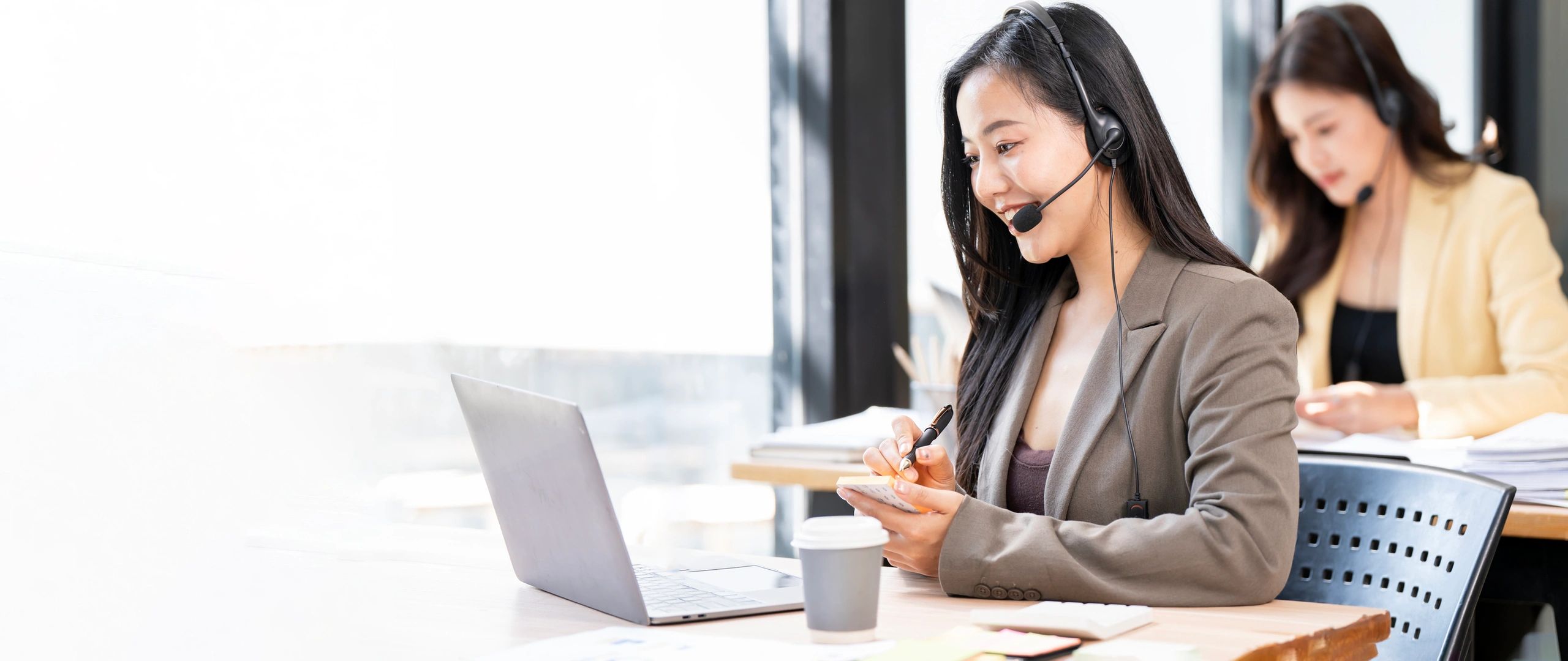 Technology support team assisting business clients